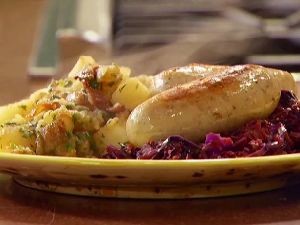 Braised bockwurst and warm vegetable-hard cider 'kraut with German style potatoes Recipe | Food Netw