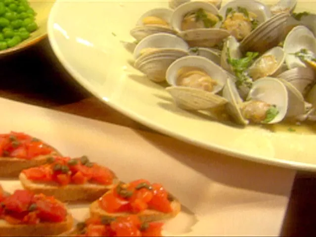 Braised clams in parsley broth, peas and bruschetta with tomatoes and fried capers Recipe | Food Net