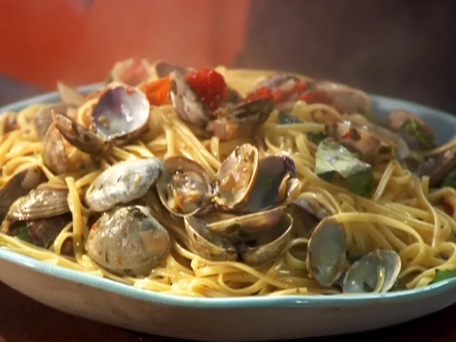Cherry tomato red clam sauce with linguine Recipe | Food Network UK