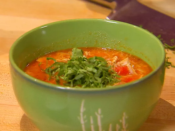 Chicken stew with tomatoes and escarole Recipe | Food Network UK