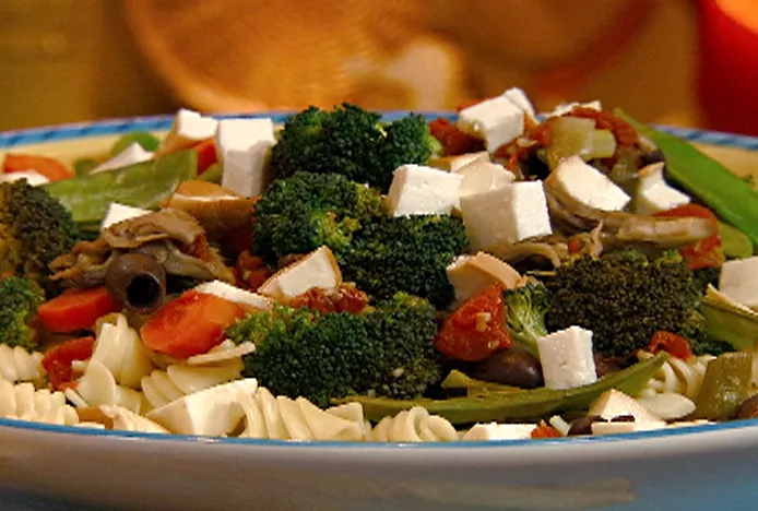 Pasta spirals with sauteed vegetables, olives and smoked mozzarella Recipe | Food Network UK