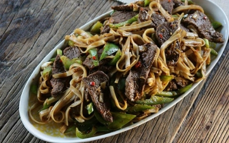 Sizzling Black Bean Beef with Noodles Recipe | Food Network UK