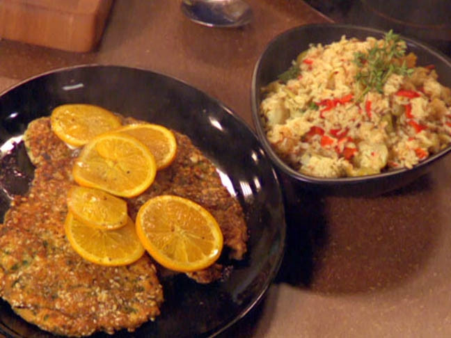 Spanish Chicken Cutlets and Olive Rice with Artichokes and Piquillo Peppers Recipe | Food Network UK