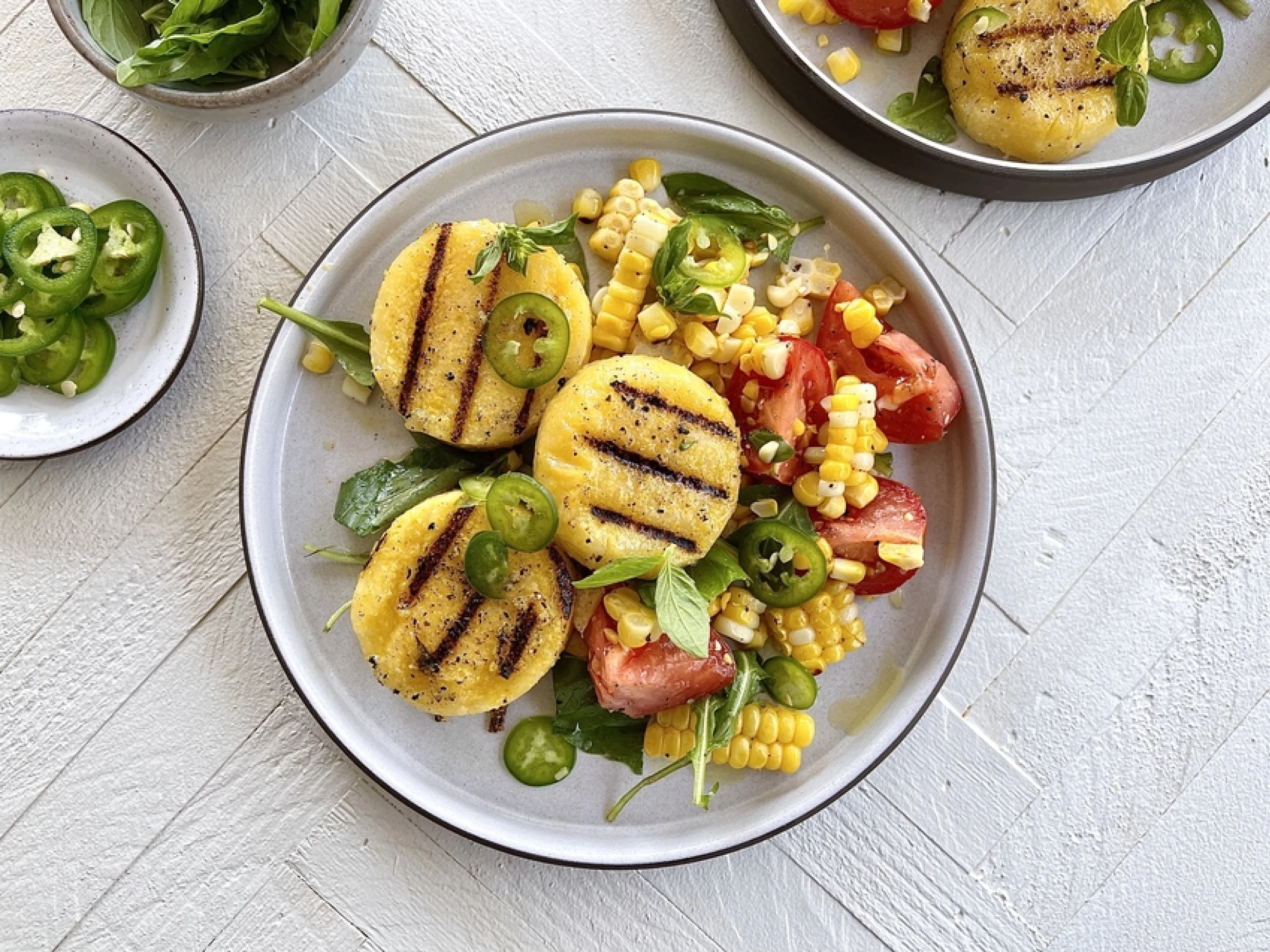 grilled polenta on a bed of salad