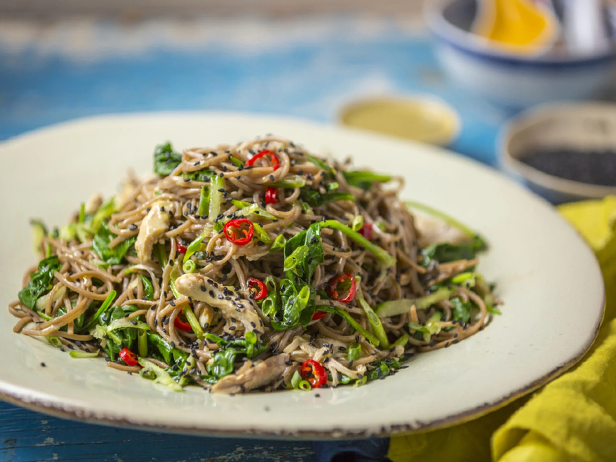 sesame chicken with soba noodles and spinach
