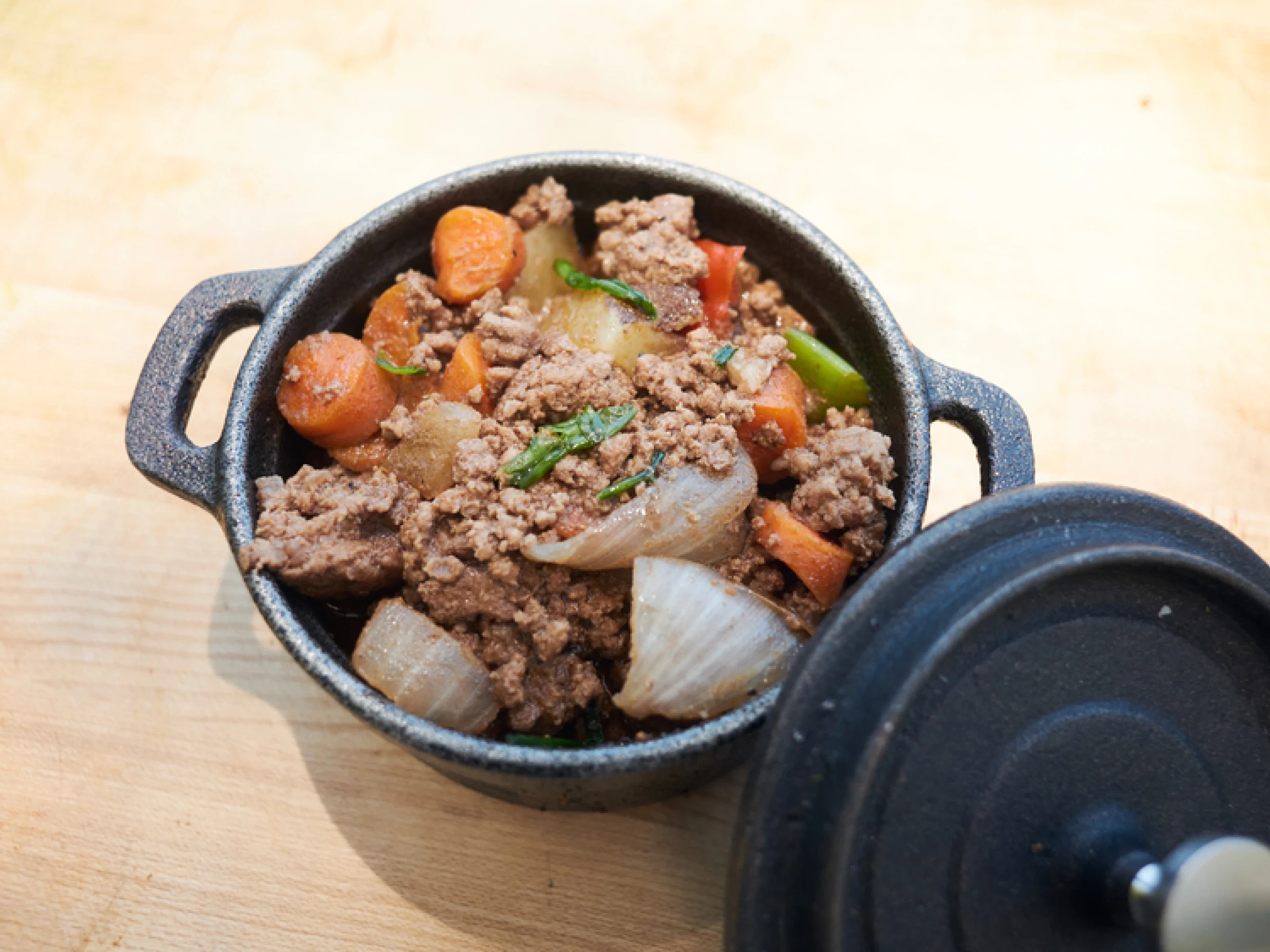 beef and stout stew with onions and carrots