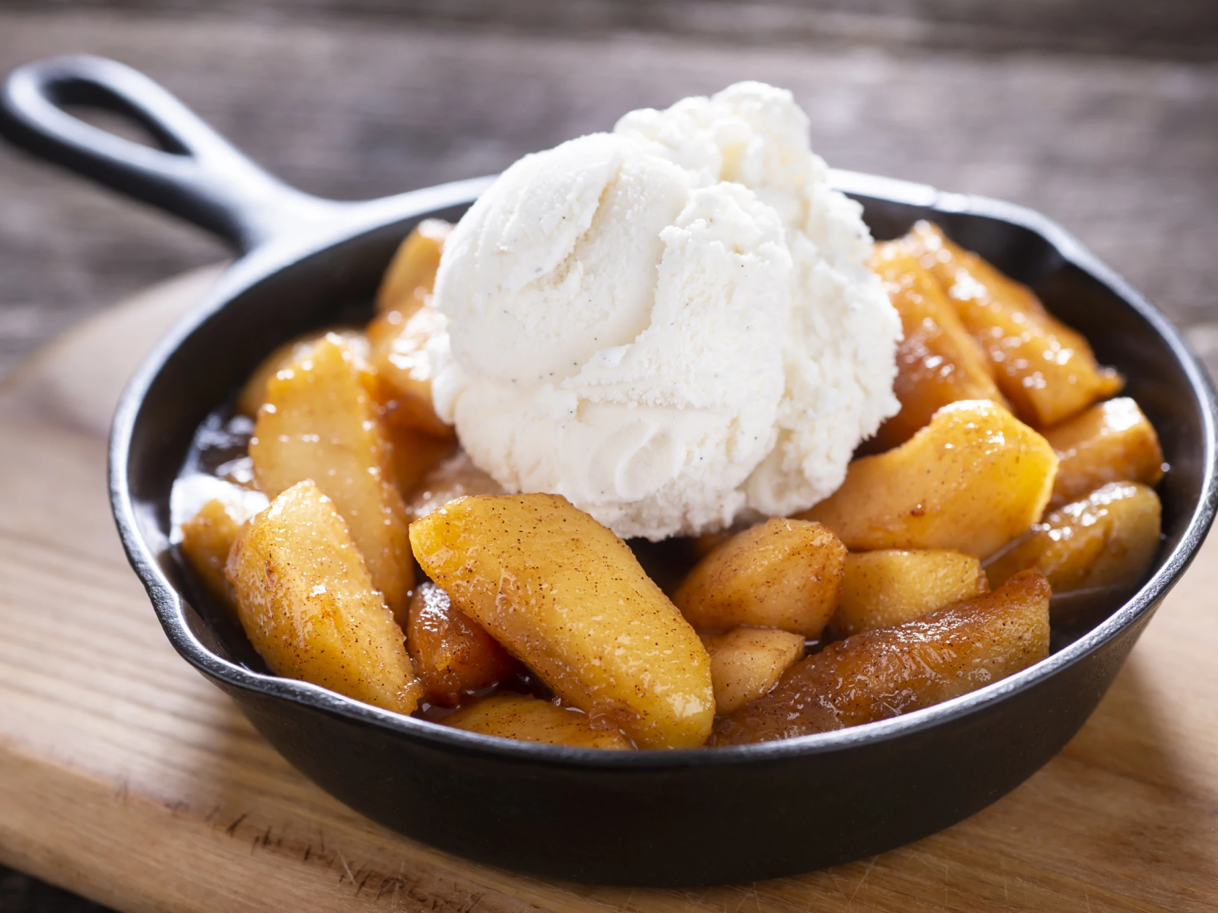 apple and ice cream in a dish