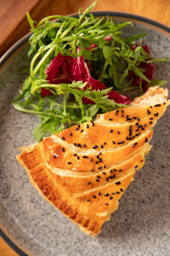 Salmon Pithivier with spring onions, chives and dill