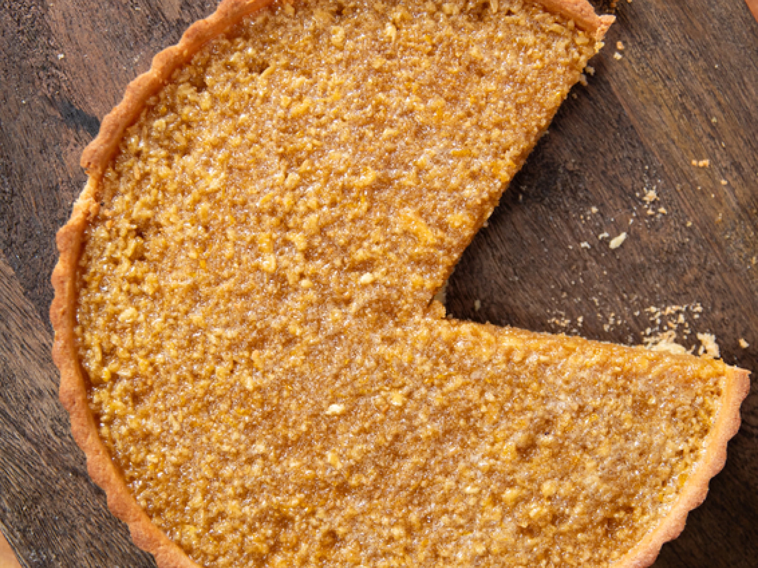 Marcus Wareing treacle tart with slice cut out