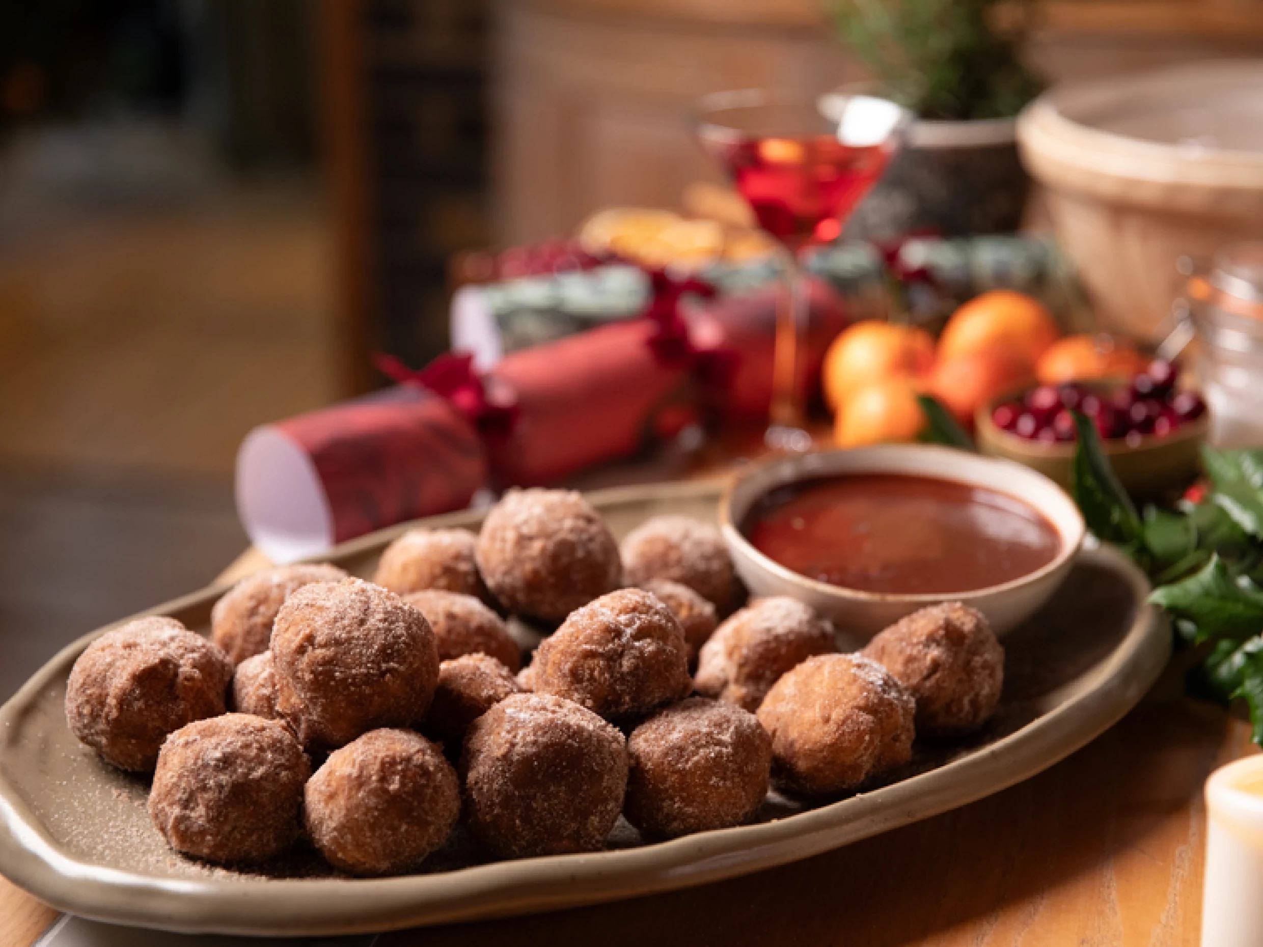 doughnut balls in chocolate sauce