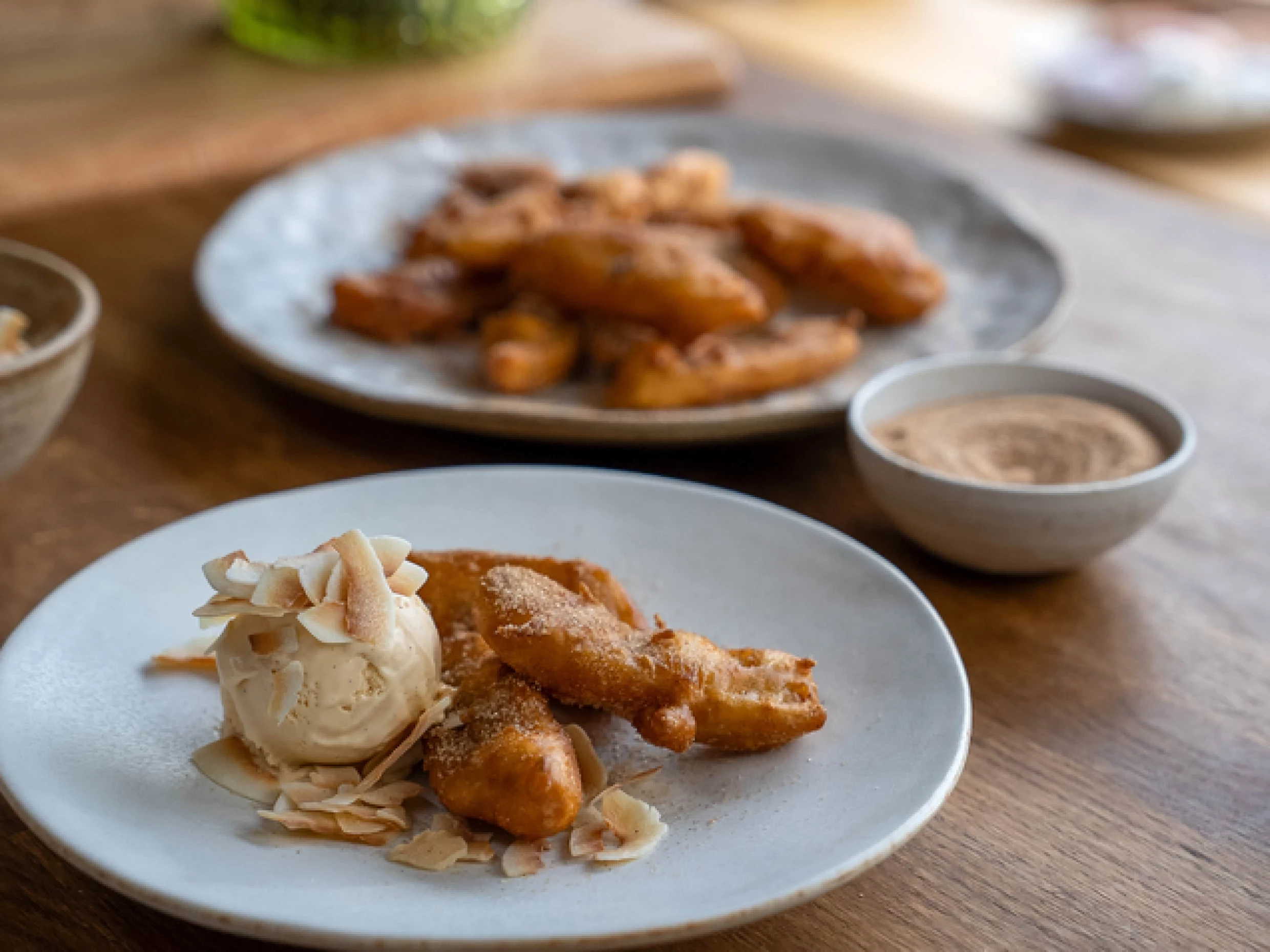 Banana fritters with coconut ice cream